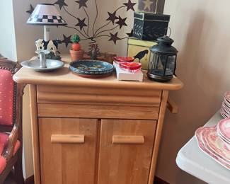 Rolling wooden kitchen island/cart.