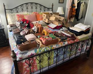 King-size bed (metal frame) with mattress and box; large selection of name-brand women’s clothing, including many shoes, handbags and accessories.