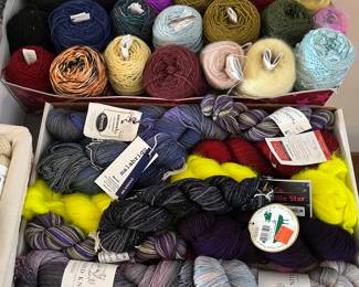 Hundreds of skeins of quality yarn. More shown in following photos.