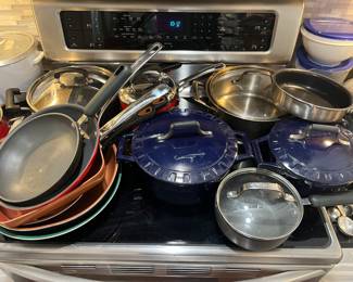 Numerous pots and pans in very good condition.