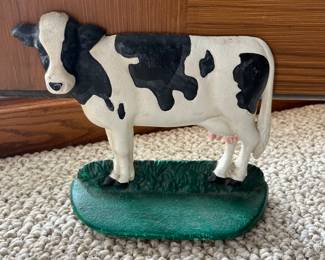 Cast iron cow doorstop.