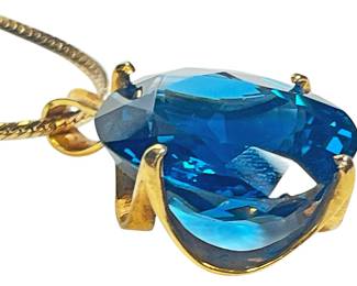 Blue Topaz Stone in Gold Tone Setting