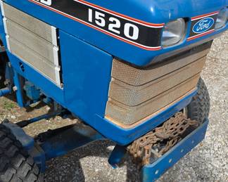 1520 Ford Tractor HST, Diesel, 1,100 hours  (Tiller to be sold separately.)