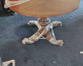 $1,430 - Round Thomasville Table with Pedestal Base and four dining chairs. Includes pads
