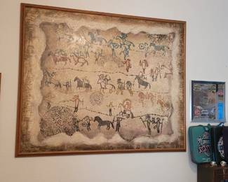 Multiple framed paintings and pictures