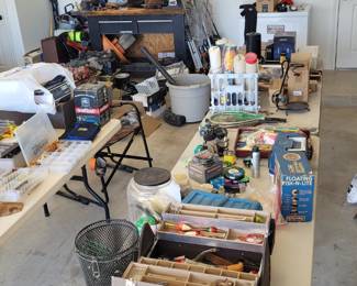 Fishing tackles, poles, and boxes. Vintage lures.