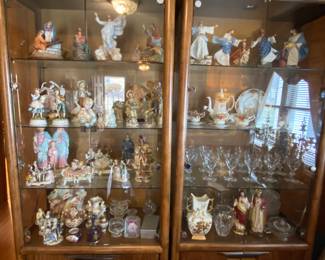 Cabinets loaded with vintage and antique items.