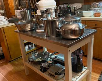 Kitchen is loaded with great cooking supplies. 
