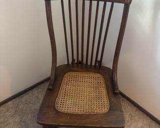 1900's Spindle Back Rocking Chair with Cane Seat