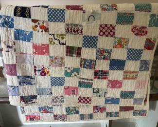 White/Multicolored Patchwork Quilt