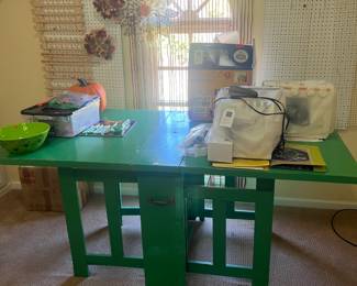 Sewing/Cutting Table, Pegboard, Sewing machine and Sergers