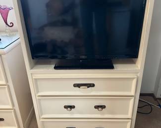 Insignia TV fits perfectly into matching bedroom furniture , includes remote, three drawers below in cabinet is 28” wide x 19 deep x x 44” high holds up to 30” TV