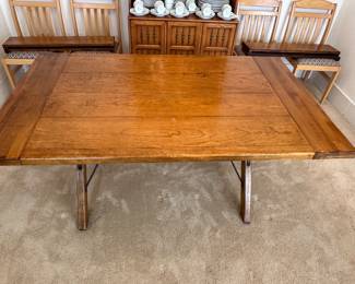Dining table shown without extensions measures 36 x 60”
