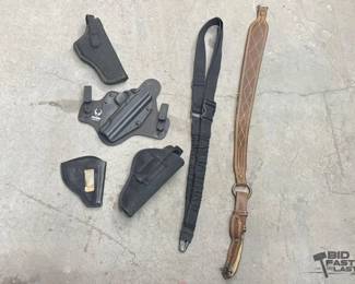 2596  4 Pistol Holsters  2 Slings 