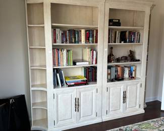 C54 - $250. 2 Piece Lighted Bookcase / Display Cabinet. Each Half measures 49" wide x 16" deep x 89.5" tall (assembled it is 98" long) has adjustable shelves with glass inserts. 