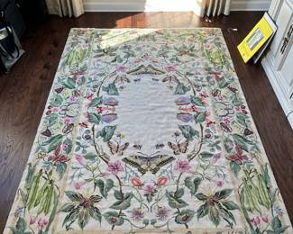 C33 - $275. Needlepoint Rug with Butterflies & Flowers. Measures 68" x 104"