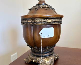 C7 - $12. Decorative Lidded Vessel. Measures 7" wide x 10" tall. 