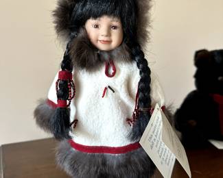 C63 - $25. Alaska Friends Porcelain Doll. 