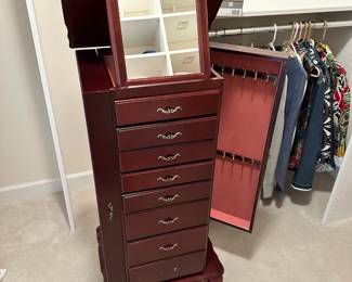 C20 - $60. Stand up Jewelry Box. Measures 18" wide x 15" deep x 40.5" tall. Missing Bottom Drawer Pull. 