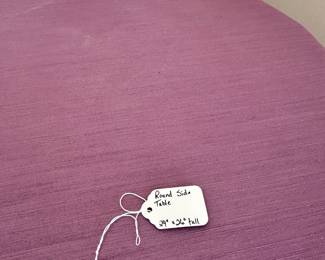 C12 - $30. Round Side Table with Purple Linens. Measures 24" round x 26" tall. Round Side Table with Purple Linens. Measures 24" round x 26" tall. 