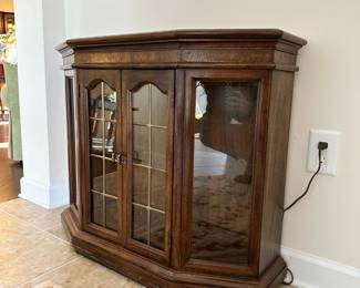 C31 - $50. Lighted Small Display Cabinet with glass shelf. Measures 36" wide x 12" deep x 30" tall. 