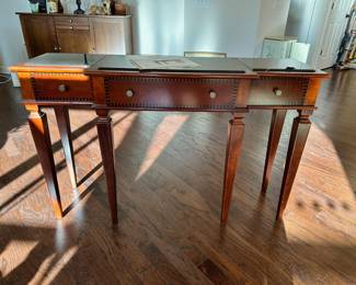 C25 - $125. Bailey Street "Belgravia Server" in excellent condition. Top has 3 pieces of marble. Measures 52" wide x 16" deep x 32.5" tall. Felt Lined Drawers. 