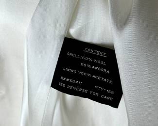 C60 - $50. Size 10. Donatella 50% Wool 50% Angora Jacket. 