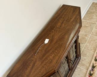 C31 - $50. Lighted Small Display Cabinet with glass shelf. Measures 36" wide x 12" deep x 30" tall. 