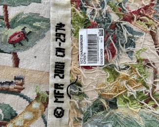 C33 - $275. Needlepoint Rug with Butterflies & Flowers. Measures 68" x 104"