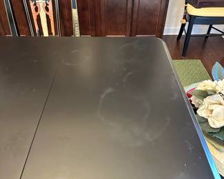 C42 - $350. Black Dining Room Table with 5 Chairs & Bench. With Leaf  in Table measures 62" long x 42" wide x 30" tall. (Leaf if 20") Without leaf table is 42" square.  Very Sturdy! Minor marks on the top from use. 