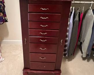 C20 - $60. Stand up Jewelry Box. Measures 18" wide x 15" deep x 40.5" tall. Missing Bottom Drawer Pull. 