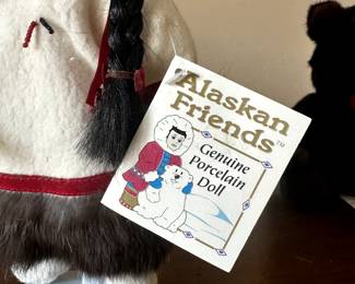 C63 - $25. Alaska Friends Porcelain Doll. 
