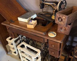 Singer Sphinx sewing machine and cabinet. Sewing cabinet drawers.