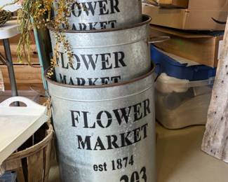 Three metal flower market buckets. Three sizes, large to small