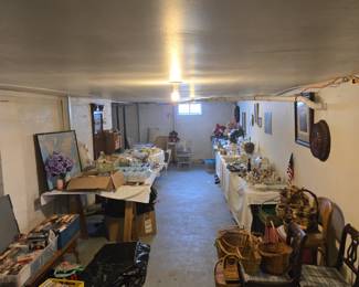 Baskets, DVDs, VCR Tapes, Albums, world map, material, a lot of misc. items.