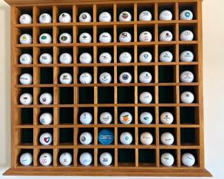 collection of Golf Balls & Display Shelf