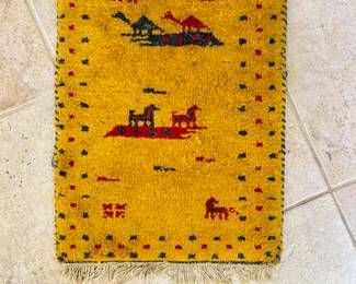 Lots of these little tribal rugs