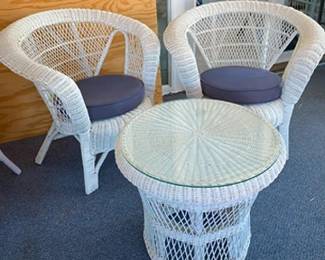 Wicker Chairs and small glass-top table