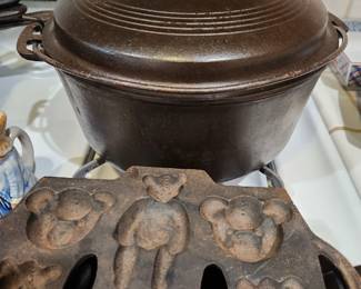 Cast iron Dutch oven and teddy bear mold