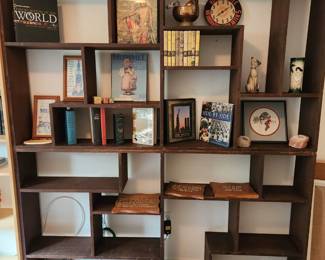 Redwood stained book case/shelves, various books and wooden plaques