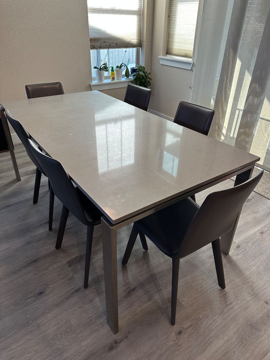 Room and Board stainless steel dining table with six chairs