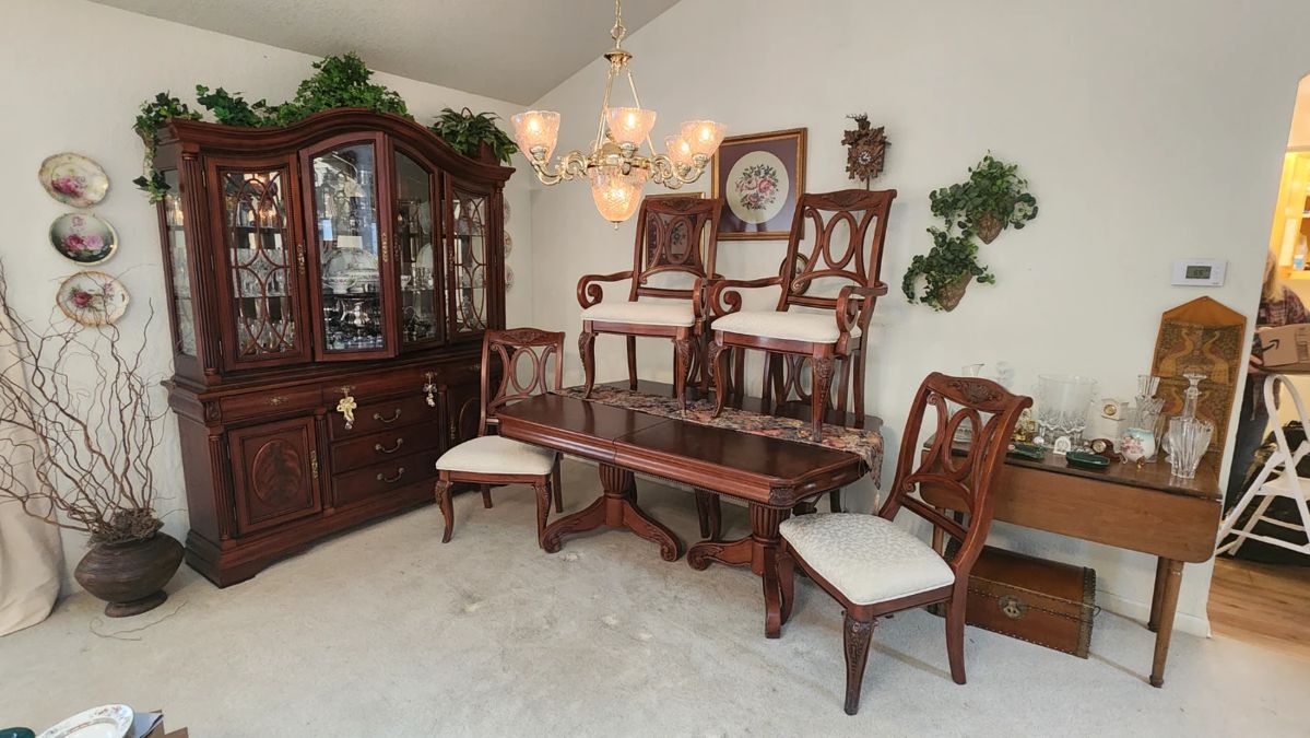 Dining table with 2 captain's chairs and 4 side chairs, matching, lighted china cabinet