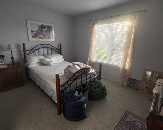 Full bed, night stand, tables, art, window coverings. No smoking No pet home. 