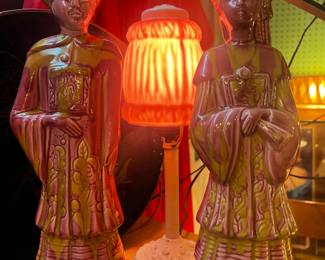 Artistic Potteries man and woman in a pink and yellow drip glaze.