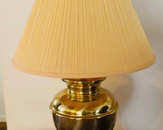 Footed brass lamp
