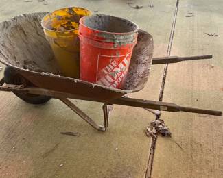 Old wheelbarrow and buckets