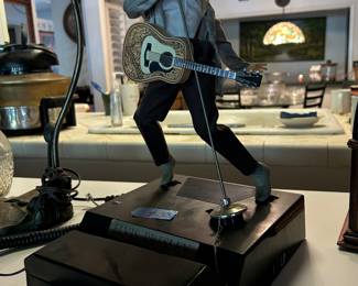 This is a vintage telephone, Elvis dances and sings