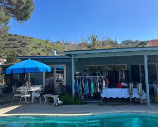 So many racks of clothes and patio sets