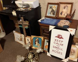 Ceiling fan, framed pictures, desk, nightstand