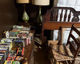 Puzzles, tapes, movies, audio books, queen bed, lamps, chair, coffee table